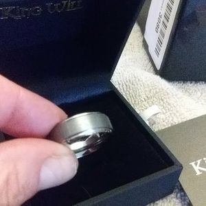 Mens size 9.5 tungston carbide wedding band.